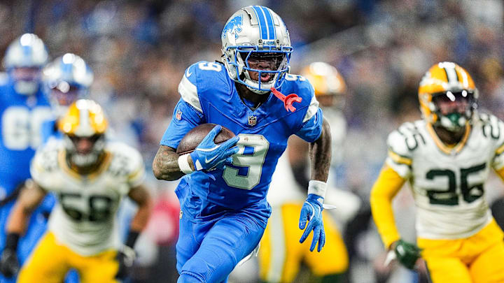 Detroit Lions wide receiver Jameson Williams (9) makes a catch and runs for a first down against Green Bay Packers during the first half at Ford Field in Detroit on Thursday, Dec. 5, 2024.