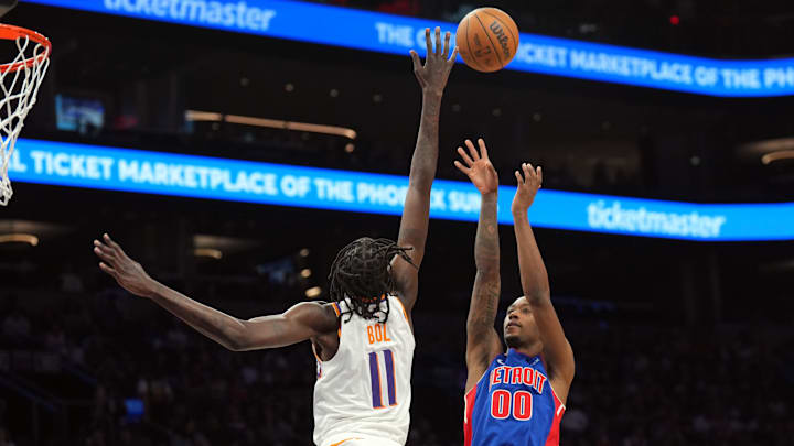 Oct 11, 2024; Phoenix, Arizona, USA; Detroit Pistons forward Ron Holland II (00) shoots over Phoenix Suns center Bol Bol (11) : Joe Camporeale-Imagn Images