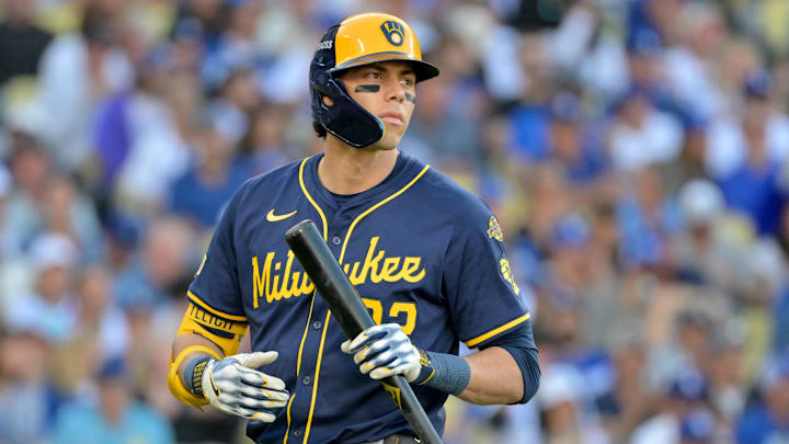 Oct 16, 2025; Los Angeles, California, USA; Milwaukee Brewers left fielder Christian Yelich (22) reacts after striking out against the Los Angeles Dodgers in the sixth inning during game three of the NLCS round for the 2025 MLB playoffs at Dodger Stadium. Mandatory Credit: Jayne Kamin-Oncea-Imagn Images