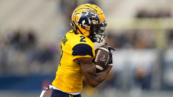 Kent State wide receiver Chrishon McCray turns after a catch against St. Francis (Pa.), Sept. 7, 2024. Kent State wide receiver Chrishon McCray turns after a catch against St. Francis (Pa.), Sept. 7, 2024.