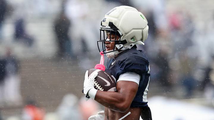 Penn State Nittany Lions running back James Peoples carries the ball during the Blue-White Spring game at Beaver Stadium.