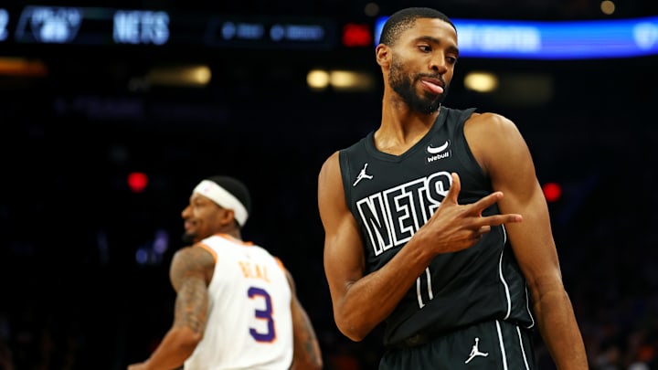 Dec 13, 2023; Phoenix, Arizona, USA; Brooklyn Nets forward Mikal Bridges (1) reacts after a play