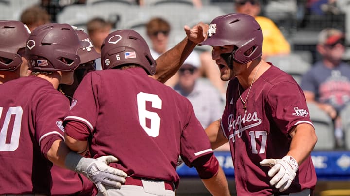 May 21, 2025; Hoover, AL, USA; Texas A&M centerfielder Jace LaViolette (17) is greeted at the plate after hitting a grand slam against Mississippi State in the first round of the SEC Baseball Tournament at the Hoover Met.