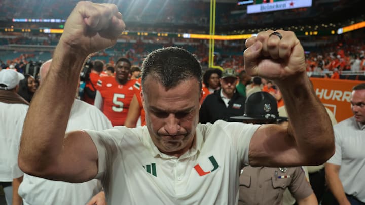 Aug 31, 2025; Miami Gardens, Florida, USA; Miami Hurricanes head coach Mario Cristobal reacts after defeating the Notre Dame Fighting Irish at Hard Rock Stadium. Mandatory Credit: Sam Navarro-Imagn Images