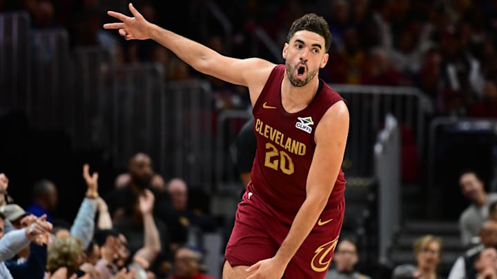 Nov 20, 2024; Cleveland, Ohio, USA; Cleveland Cavaliers forward Georges Niang (20) celebrates after hitting a three point basket during the second half against the New Orleans Pelicans at Rocket Mortgage FieldHouse. Mandatory Credit: Ken Blaze-Imagn Images