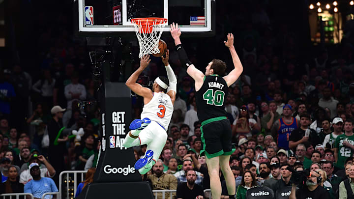 May 14, 2025; Boston, Massachusetts, USA; Boston Celtics center Luke Kornet (40) fouls New York Knicks guard Josh Hart (3) in the second half during game five of the second round for the 2025 NBA Playoffs at TD Garden. Mandatory Credit: Bob DeChiara-Imagn Images