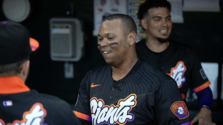 Jun 17, 2025; San Francisco, California, USA; San Francisco Giants designated hitter Rafael Devers (16) greets his new teammates in the dugout before taking on the Cleveland Guardians during the first inning at Oracle Park. Mandatory Credit: D. Ross Cameron-Imagn Images Jun 17, 2025; San Francisco, California, USA; San Francisco Giants designated hitter Rafael Devers (16) greets his new teammates in the dugout before taking on the Cleveland Guardians during the first inning at Oracle Park. Mandatory Credit: D. Ross Cameron-Imagn Images