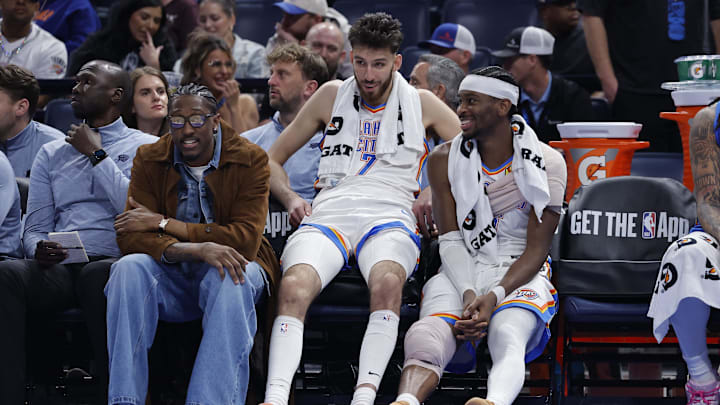 Nov 12, 2025; Oklahoma City, Oklahoma, USA; Oklahoma City Thunder guard Jalen Williams (8), center Chet Holmgren (7), and guard Shai Gilgeous-Alexander (2) talk while sitting on the bench during the fourth quarter against the Los Angeles Lakers at Paycom Center.