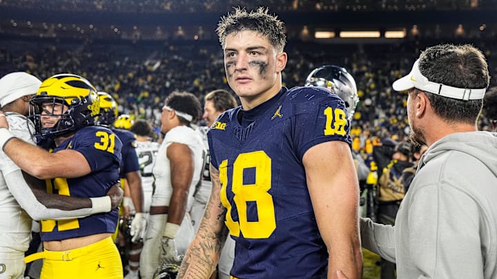 Michigan tight end Colston Loveland (18) walks off the field after 38-17 loss to Oregon at Michigan Stadium in Ann Arbor on Saturday, Nov. 2, 2024.