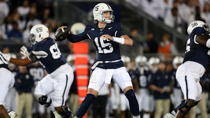 Penn State quarterback Drew Allar throws a pass during the first quarter against the Illinois Fighting Illini at Beaver Stadium. Penn State quarterback Drew Allar throws a pass during the first quarter against the Illinois Fighting Illini at Beaver Stadium.