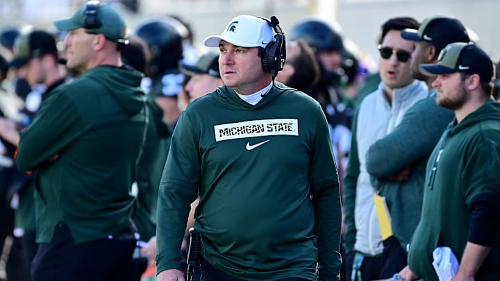 Nov 2, 2024; East Lansing, Michigan, USA;  Michigan State Spartans head coach Jonathan Smith looks over his sidelines during the first quarter against the Indiana Hoosiers at Spartan Stadium. Mandatory Credit: Dale Young-Imagn Images
