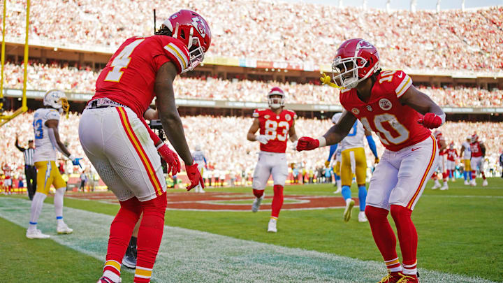 Oct 22, 2023; Kansas City, Missouri, USA; Kansas City Chiefs wide receiver Rashee Rice (4) celebrates with running back Isiah Pacheco (10) after scoring a touchdown against the Los Angeles Chargers during the second half at GEHA Field at Arrowhead Stadium. Mandatory Credit: Jay Biggerstaff-Imagn Images