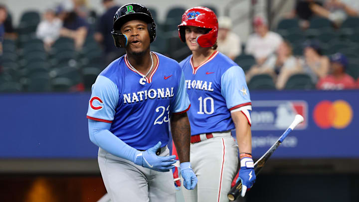 Aidan Miller (right) hasn't swung a bat since spring training began.