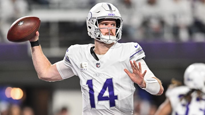 Dec 16, 2024; Minneapolis, Minnesota, USA; Minnesota Vikings quarterback Sam Darnold (14) throws a pass against the Chicago Bears during the third quarter at U.S. Bank Stadium. Mandatory Credit: Jeffrey Becker-Imagn Images