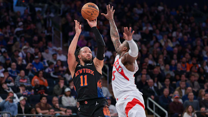 Apr 10, 2026; New York, New York, USA; New York Knicks guard Jalen Brunson (11) shoots the ball as Toronto Raptors guard Jamal Shead (23) defends during the second half at Madison Square Garden. Mandatory Credit: Vincent Carchietta-Imagn Images 
