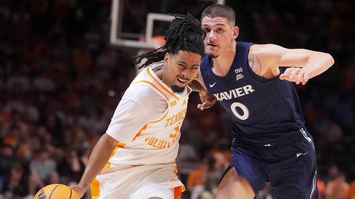 Tennessee guard Terrence Hill Jr. (3) tries to advance the ball while guarded by Xavier forward Gabriel Pozzato (0) during a college basketball exhibition game on Oct. 15, 2026, in Knoxville, Tennessee. Tennessee guard Terrence Hill Jr. (3) tries to advance the ball while guarded by Xavier forward Gabriel Pozzato (0) during a college basketball exhibition game on Oct. 15, 2026, in Knoxville, Tennessee.