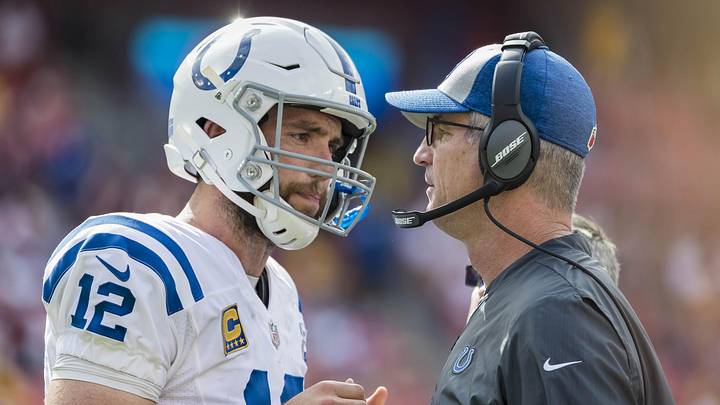 Former Indianapolis Colts quarterback Andrew Luck speaks with Frank Reich