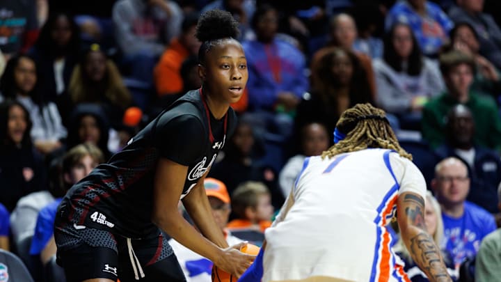 Jan 4, 2026; Gainesville, Florida, USA; South Carolina Gamecocks forward Joyce Edwards (8) looks to pass while Florida Gators forward Jade Weathersby (1) defends during the first half at Exactech Arena at the Stephen C. O'Connell Center. Mandatory Credit: Matt Pendleton-Imagn Images Jan 4, 2026; Gainesville, Florida, USA; South Carolina Gamecocks forward Joyce Edwards (8) looks to pass while Florida Gators forward Jade Weathersby (1) defends during the first half at Exactech Arena at the Stephen C. O'Connell Center. Mandatory Credit: Matt Pendleton-Imagn Images