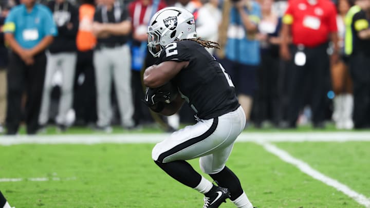 Sep 28, 2025; Paradise, Nevada, USA; Las Vegas Raiders running back Ashton Jeanty (2) runs the ball during the second half against the Chicago Bears at Allegiant Stadium. 