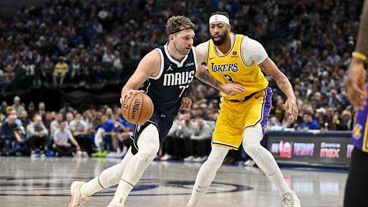 Dec 12, 2023; Dallas, Texas, USA; Dallas Mavericks guard Luka Doncic (77) and Los Angeles Lakers forward Anthony Davis (3) in action during the game between the Dallas Mavericks and the Los Angeles Lakers at the American Airlines Center. Mandatory Credit: Jerome Miron-Imagn Images