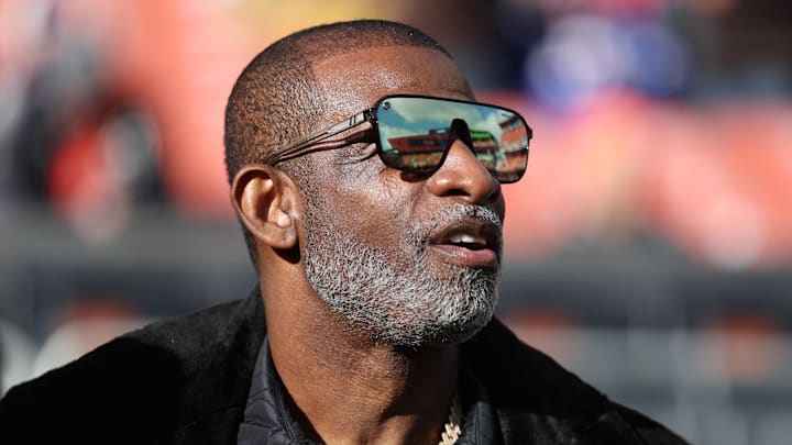 Dec 21, 2025; Cleveland, Ohio, USA;  Legendary  football and baseball player and father of Cleveland Browns quarterback Shedeur Sanders, Deion Sanders on the sidelines prior to a game against the Buffalo Bills at Huntington Bank Field. Mandatory Credit: Scott Galvin-Imagn Images