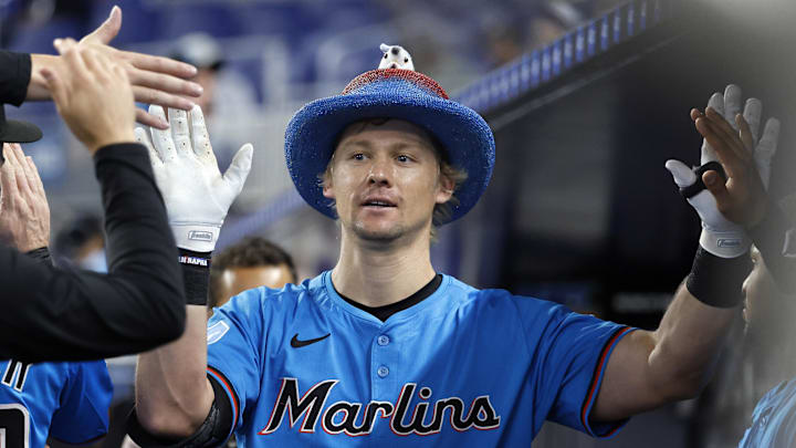 Jun 22, 2025; Miami, Florida, USA; Miami Marlins right fielder Kyle Stowers (28) is greeted in the dugout by teammates after hitting a homerun against the Atlanta Braves during the second inning at loanDepot Park. Mandatory Credit: Rhona Wise-Imagn Images Jun 22, 2025; Miami, Florida, USA; Miami Marlins right fielder Kyle Stowers (28) is greeted in the dugout by teammates after hitting a homerun against the Atlanta Braves during the second inning at loanDepot Park. Mandatory Credit: Rhona Wise-Imagn Images