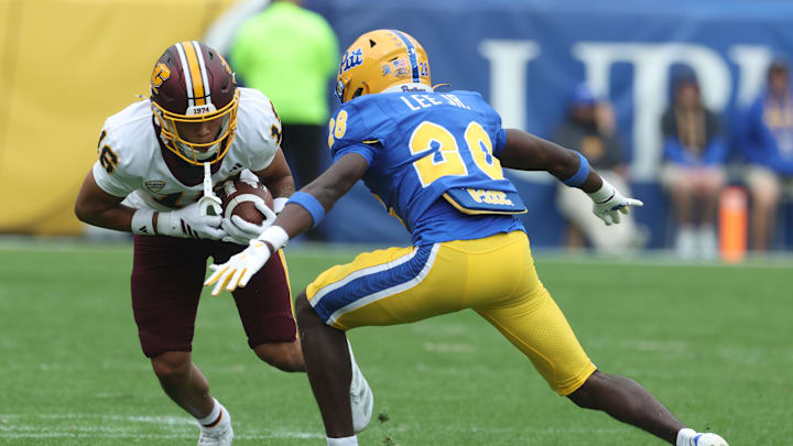Sep 6, 2025; Pittsburgh, Pennsylvania, USA;  Central Michigan Chippewas wide receiver Nasir Williams (16) runs after a catch against Pittsburgh Panthers defensive back Shawn Lee Jr. (28) during the third quarter at Acrisure Stadium. Mandatory Credit: Charles LeClaire-Imagn Images