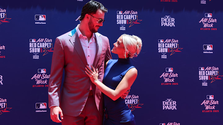 Jul 15, 2025; Atlanta, GA, USA; National League pitcher Paul Skenes (30) of the Pittsburgh Pirates and social media influencer Livvy Dunne pose for a photo on the red carpet before the 2025 MLB All Star Game at Truist Park. Mandatory Credit: Brett Davis-Imagn Images