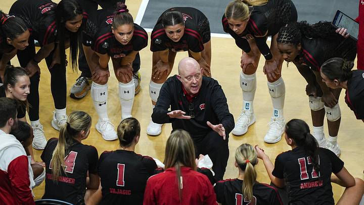 Dec 18, 2025; Kansas City, MO, USA; Wisconsin Badgers head coach Kelly Sheffield talks to his players during a timeout in the third set against the Kentucky Wildcats in a 2025 NCAA Women’s Volleyball Championship semifinal match at T-Mobile Center. Mandatory Credit: Jay Biggerstaff-Imagn Images