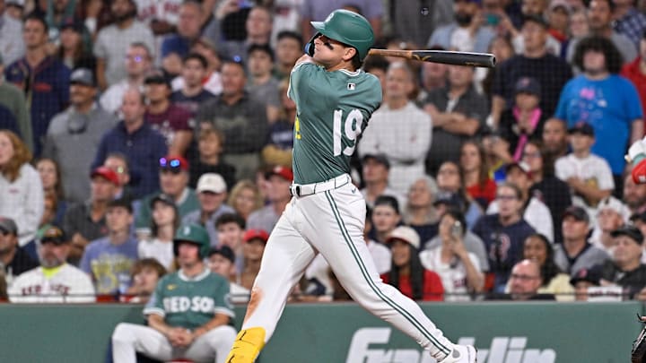 Aug 1, 2025; Boston, Massachusetts, USA; Boston Red Sox left fielder Roman Anthony (19) hits a game winning RBI against the Houston Astros during the tenth inning inning at Fenway Park. Mandatory Credit: Eric Canha-Imagn Images