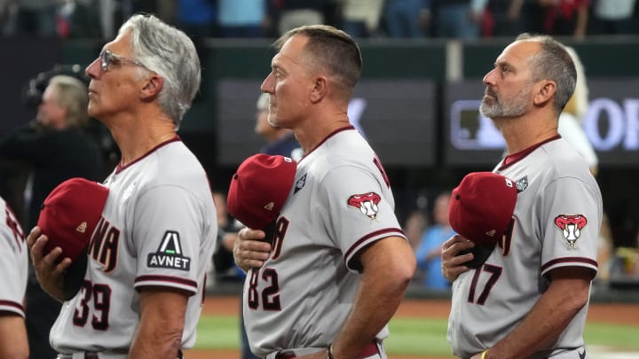 Arizona Diamondbacks manager Torey Lovullo (17) and bench coach Jeff Banister (82) look on before game two of the 2023 World Series against the Texas Rangers at Globe Life Field on Oct. 28, 2023, Arlington, Texas.