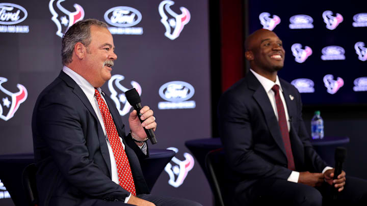 Feb 2, 2023; Houston, TX, USA; Houston Texans head coach Demeco Ryans listens during his introductory press conference as owner Cal McNair (left) speaks to the media at NRG Stadium. Mandatory Credit: Erik Williams-Imagn Images