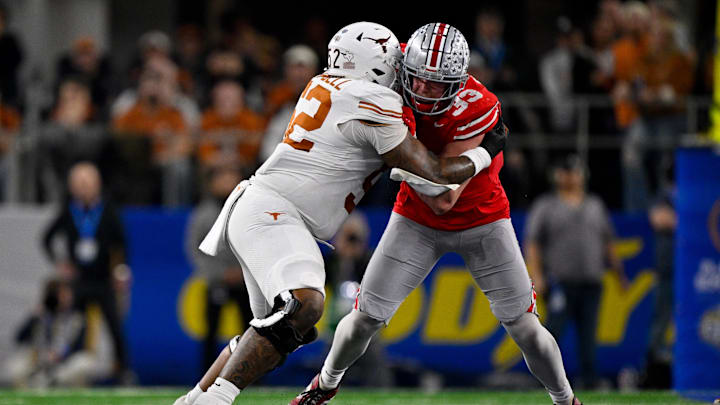 Jan 10, 2025; Arlington, TX, USA; Texas Longhorns offensive lineman DJ Campbell (52) and Ohio State Buckeyes defensive end Jack Sawyer (33) in action during the game between the Texas Longhorns and the Ohio State Buckeyes at AT&T Stadium. Jan 10, 2025; Arlington, TX, USA; Texas Longhorns offensive lineman DJ Campbell (52) and Ohio State Buckeyes defensive end Jack Sawyer (33) in action during the game between the Texas Longhorns and the Ohio State Buckeyes at AT&T Stadium.