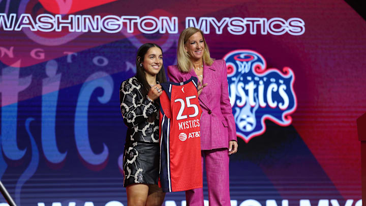 Apr 14, 2025; New York, New York, USA; Georgia Amoore poses with WNBA commissioner Cathy Engelbert after being selected with the number six overall pick to the Washington Mystics in the 2025 WNBA Draft at The Shed at Hudson Yards. Mandatory Credit: Vincent Carchietta-Imagn Images 