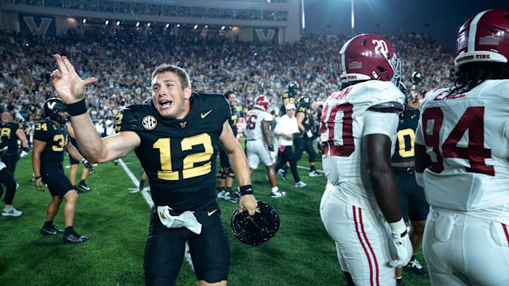 Vanderbilt Commodores linebacker Jeffrey Ugochukwu (12) celebrates after knocking off the Alabama Crimson Tide 40-35 at Vanderbilt Stadium in Nashville, Tenn., Saturday, Oct. 5, 2024.
