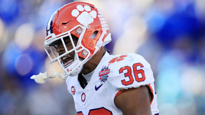 Clemson Tigers safety Khalil Barnes (36) reacts to his forced fumble for a turnover during the fourth quarter of an NCAA football matchup in the TaxSlayer Gator Bowl Friday, Dec. 29, 2023 at EverBank Stadium in Jacksonville, Fla. The Clemson Tigers edged the Kentucky Wildcats 38-35. [Corey Perrine/Florida Times-Union]