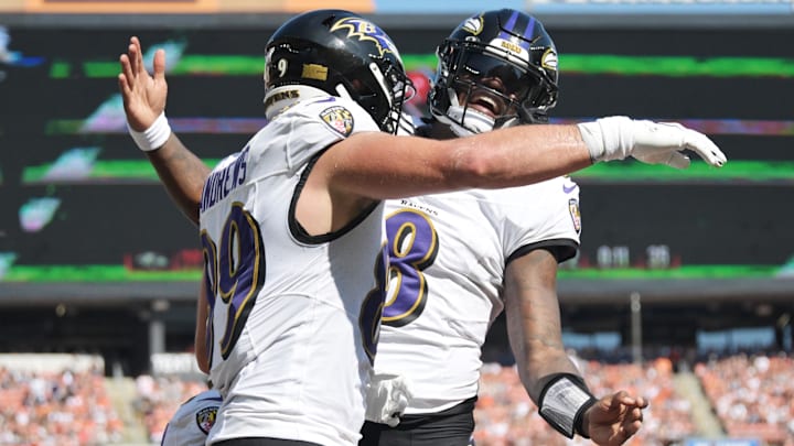 Oct 1, 2023; Cleveland, Ohio, USA; Baltimore Ravens tight end Mark Andrews (89) and quarterback Lamar Jackson (8) celebrate after Andrews caught a touchdown from Jackson during the first half at Cleveland Browns Stadium. Mandatory Credit: Ken Blaze-Imagn Images.