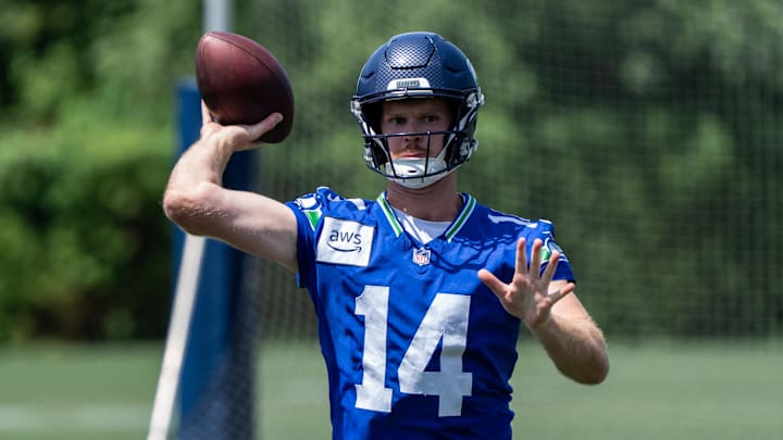 Jun 11, 2025; Renton, WA, USA; Seattle Seahawks quarterback Sam Darnold (14) passes the ball during mini-camp at Virginia Mason Athletic Center. Mandatory Credit: Stephen Brashear-Imagn Images