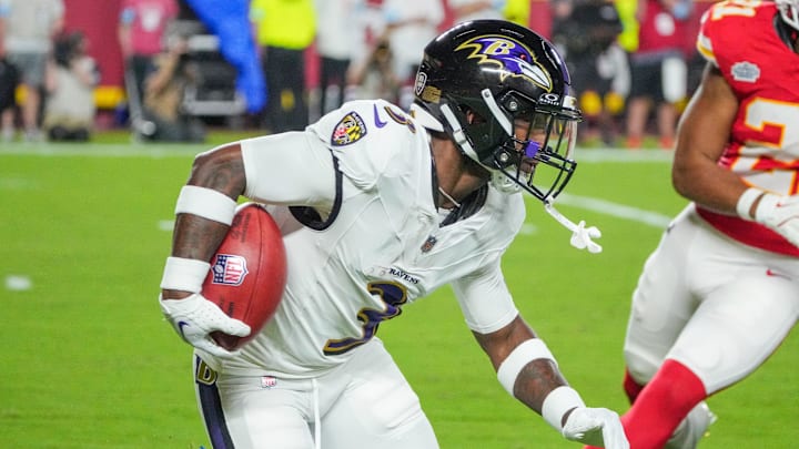 Sep 5, 2024; Kansas City, Missouri, USA; Baltimore Ravens wide receiver Deonte Harty (3) runs the ball against the Kansas City Chiefs during the second half at GEHA Field at Arrowhead Stadium. Mandatory Credit: Denny Medley-Imagn Images