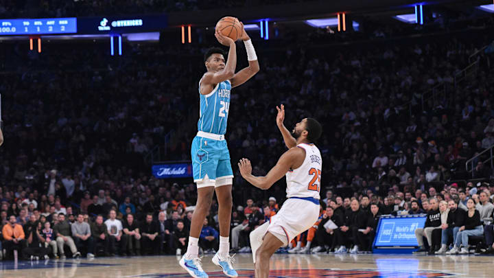Dec 5, 2024; New York, New York, USA; Charlotte Hornets forward Brandon Miller (24) shoots the ball while being defended by New York Knicks forward Mikal Bridges (25) during the first half at Madison Square Garden. Mandatory Credit: John Jones-Imagn Images Dec 5, 2024; New York, New York, USA; Charlotte Hornets forward Brandon Miller (24) shoots the ball while being defended by New York Knicks forward Mikal Bridges (25) during the first half at Madison Square Garden. Mandatory Credit: John Jones-Imagn Images