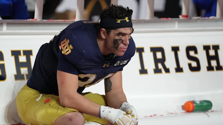 Jan 20, 2025; Atlanta, GA, USA; Notre Dame Fighting Irish linebacker Drayk Bowen (34) reacts on the bench after losing to the Ohio State Buckeyes in the CFP National Championship college football game at Mercedes-Benz Stadium. 
