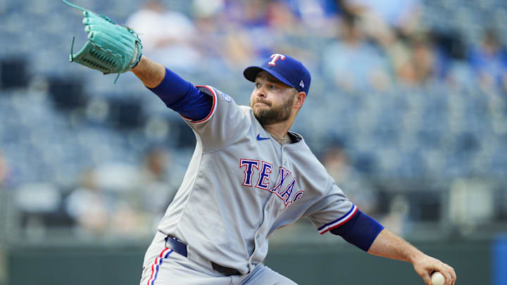 Aug 21, 2025; Kansas City, Missouri, USA; Texas Rangers relief pitcher Danny Coulombe (54) pitches during the seventh inning against the Kansas City Royals at Kauffman Stadium. Mandatory Credit: Jay Biggerstaff-Imagn Images
