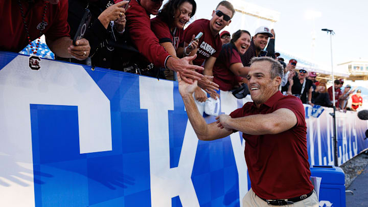 Sep 7, 2024; Lexington, Kentucky, USA; South Carolina Gamecocks head coach Shane Beamer high fives fans after the game against the Kentucky Wildcats at Kroger Field. Mandatory Credit: Jordan Prather-Imagn Images