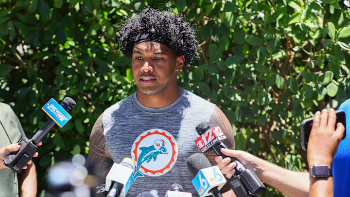 Jun 4, 2024; Miami Gardens, FL, USA; Miami Dolphins quarterback Tua Tagovailoa (1) speaks to reporters during mandatory minicamp at Baptist Health Training Complex. Mandatory Credit: Sam Navarro-USA TODAY Sports