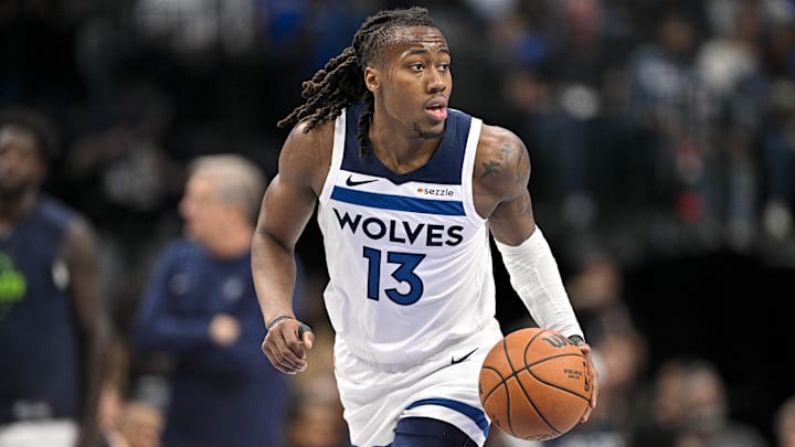 Mar 30, 2026; Dallas, Texas, USA; Minnesota Timberwolves guard Ayo Dosunmu (13) brings the ball up court against the Dallas Mavericks during the second quarter at the American Airlines Center.