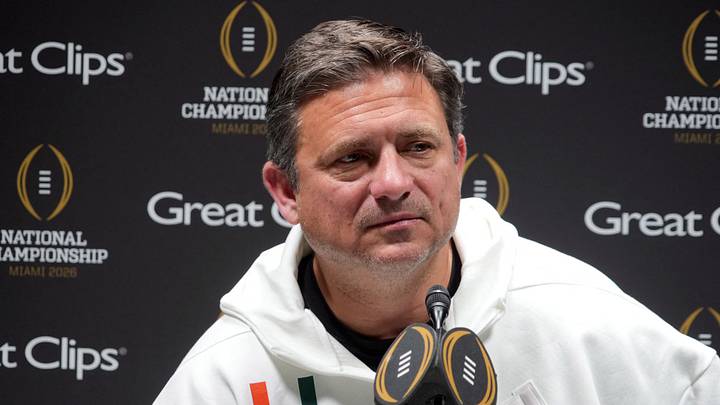 Jan 17, 2026; Miami, Florida, USA; Miami Hurricanes offensive coordinator Shannon Dawson during media day for the 2025 College Football Playoff National Championship at Miami Beach Convention Center. Mandatory Credit: Kirby Lee-Imagn Images Jan 17, 2026; Miami, Florida, USA; Miami Hurricanes offensive coordinator Shannon Dawson during media day for the 2025 College Football Playoff National Championship at Miami Beach Convention Center. Mandatory Credit: Kirby Lee-Imagn Images