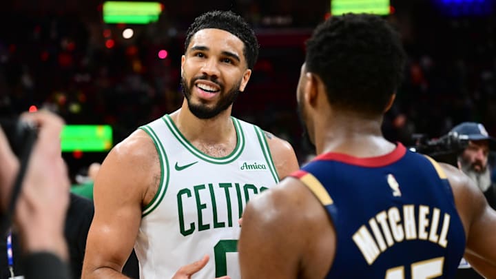 Mar 8, 2026; Cleveland, Ohio, USA; Cleveland Cavaliers guard Donovan Mitchell (45) talks to Boston Celtics forward Jayson Tatum (0) after the game at Rocket Arena. Mandatory Credit: Ken Blaze-Imagn Images