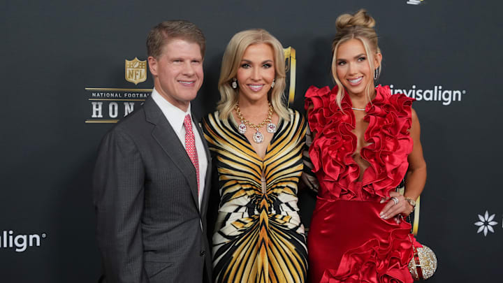 Feb 6, 2025; New Orleans, LA, USA;  Kansas City Chiefs owner Clark Hunt (left) with his wife Tavia Shackles (center) and daughter Gracie Hunt (right)  on the red carpet before Super Bowl LIX NFL Honors at Saenger Theatre. Mandatory Credit: Kirby Lee-Imagn Images