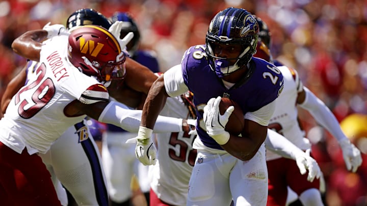 Aug 23, 2025; Landover, Maryland, USA; Baltimore Ravens running back Rasheen Ali (26) runs the ball for a touchdown during the first quarter against the Washington Commanders at Northwest Stadium. Mandatory Credit: Peter Casey-Imagn Images Aug 23, 2025; Landover, Maryland, USA; Baltimore Ravens running back Rasheen Ali (26) runs the ball for a touchdown during the first quarter against the Washington Commanders at Northwest Stadium. Mandatory Credit: Peter Casey-Imagn Images