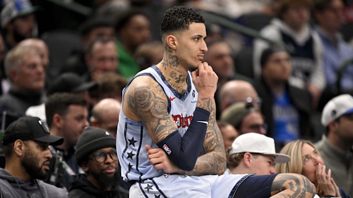 Jan 27, 2025; Dallas, Texas, USA; Washington Wizards forward Kyle Kuzma (33) looks on from the side before entering the game against the Dallas Mavericks during the second quarter at the American Airlines Center. Mandatory Credit: Jerome Miron-Imagn Images